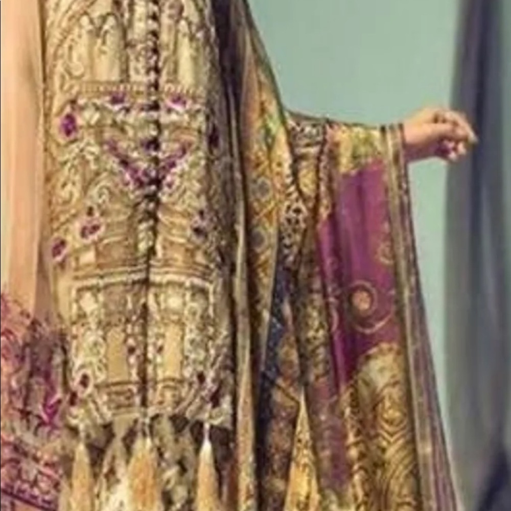 Pakistani designer wear dresses